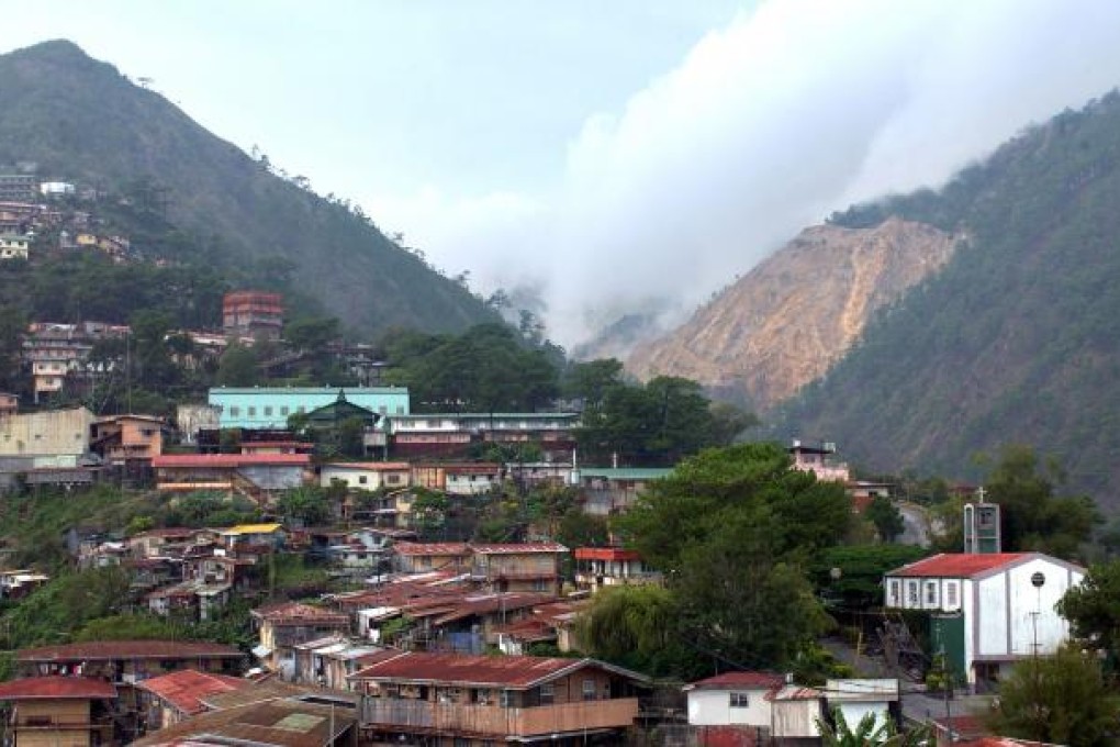 This file photo taken on May 27, 2006 shows the mining town of Padcal sitting in the ore rich Mount Santo Tomas, part of the 14,000 hectare (34,580 acre) mining concession of Philex Mining Corp., in northern Benguet province. AFP PHOTO