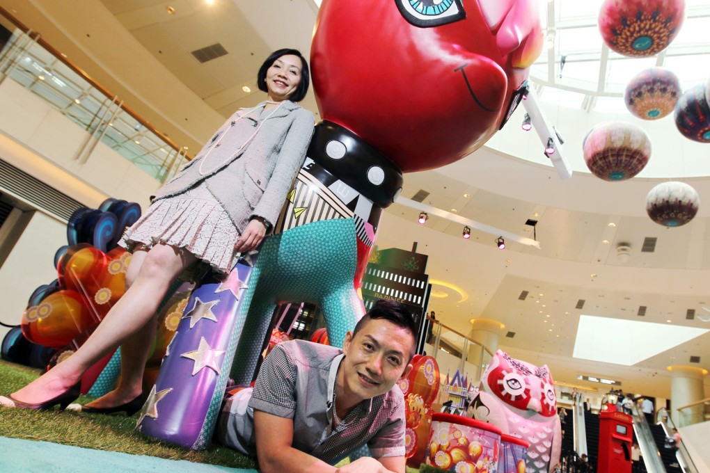 MTR Corporation's Betty Leong (left), with Pattern Production's Chan Siu-ming, says exhibitions bring shoppers to the Elements mall.Photo: May Tse