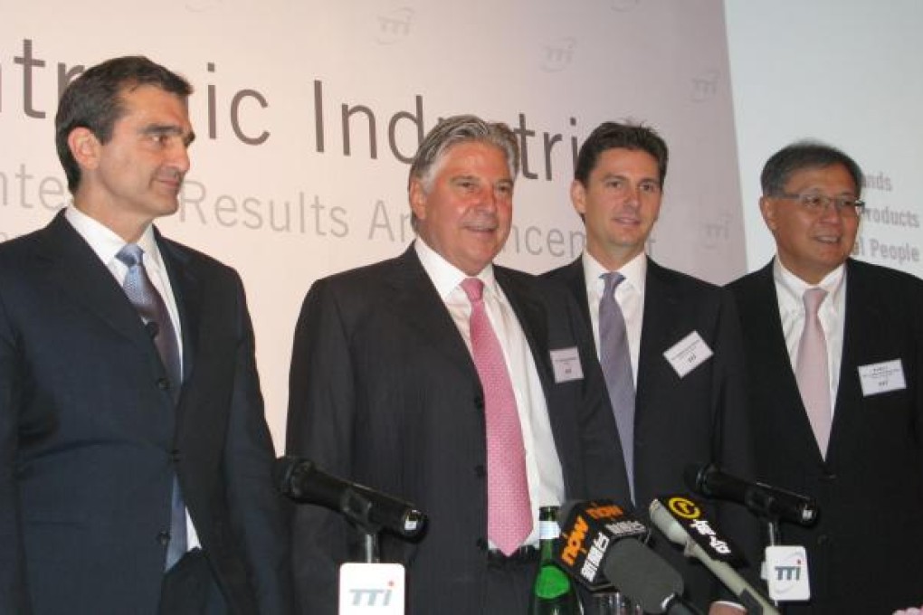 CEO Joseph Galli (left), chairman Horst Julius Pudwill, group executive director Stephan Horst Pudwill and group CFO Frank Chan Chi-chung celebrate Techtronic's record-breaking results.