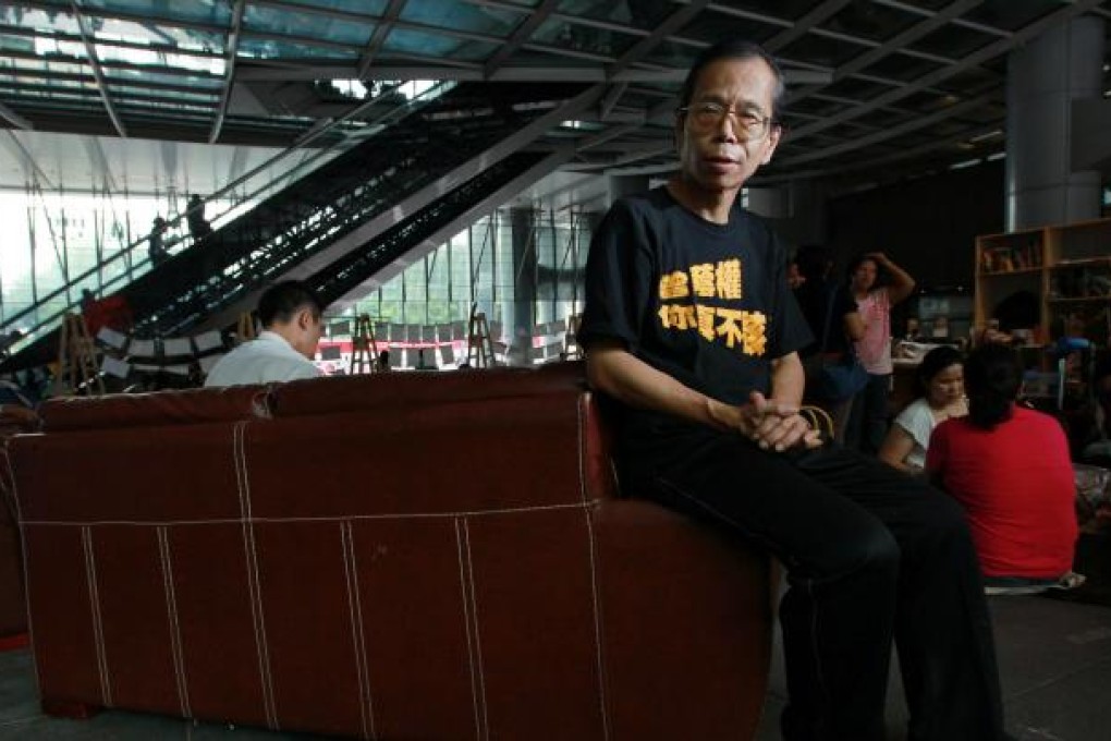 Occupy Central protester Alan Chiu is among the few activists left at the movement's camp beneath the HSBC Building on the eve of its closure. Photo: Nora Tam