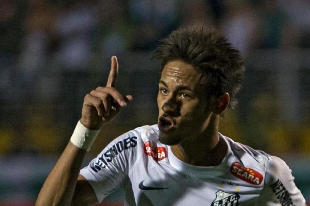 Neymar celebrates one of his two goals for Santos. Photo: AFP