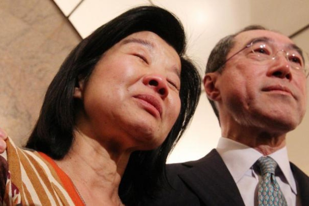 Henry Tang's wife, Lisa Kuo, took the blame for illegal alterations to their home.