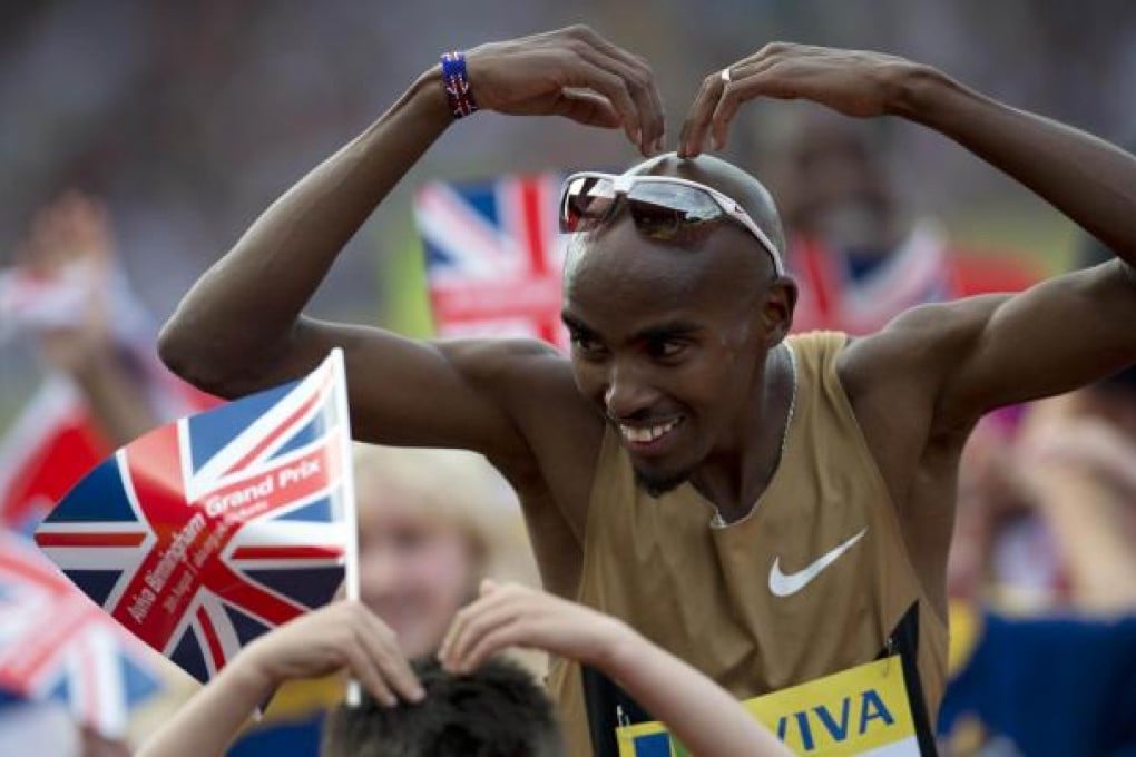 Mo Farah celebrates victory with his trademark "Mobot". Photo: AFP