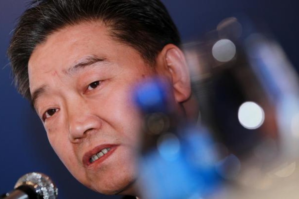 Zhang Jianguo, the president of China Construction Bank, says it hopes to maintain market share amid the profit squeeze. Photo: Nora Tam