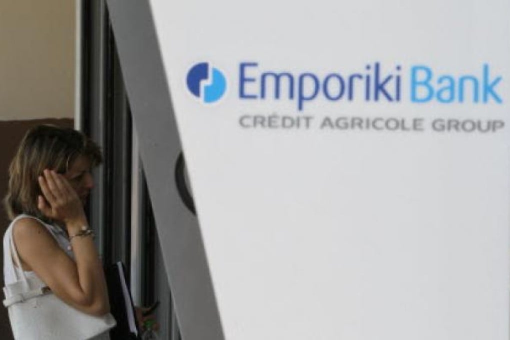 Emporiki Bank in Greece has acted as a brake on Credit Agricole's earnings. File photo: AP