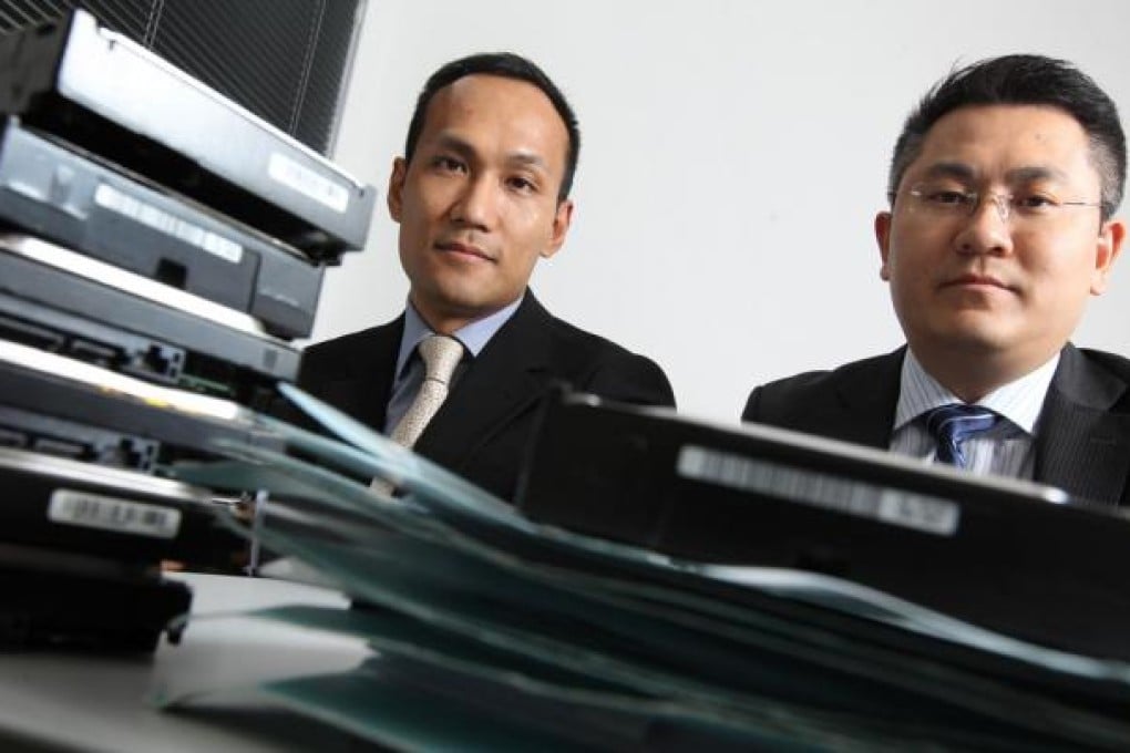 Verity Consulting's Kelvin Ko (left) and MAWSL Consulting's Andy Cheung pool their resources in corporate investigations. They have seen a big rise in cases compared with last year. Photo: Dickson Lee