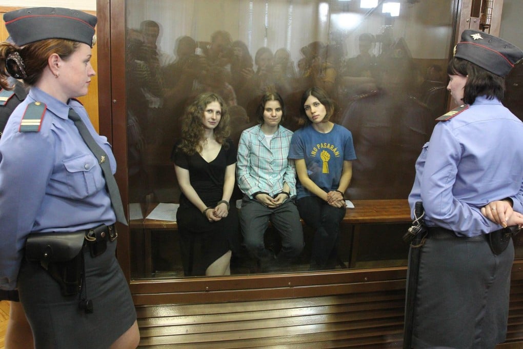 Pussy Riot members (from left) Maria Alyokhina, Yekaterina Samutsevich and Nadezhda Tolokonnikova in court after being sentenced.Photo: AFP