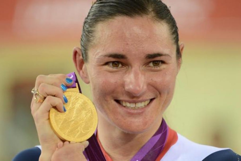 Britain's Sarah Storey with her cycling gold medal. Photo: EPA