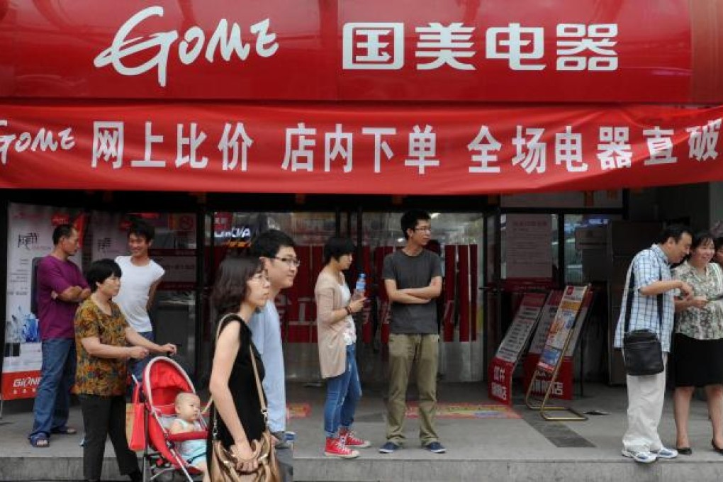 Gome says its shops give it an edge over web vendors. Photo: Xinhua