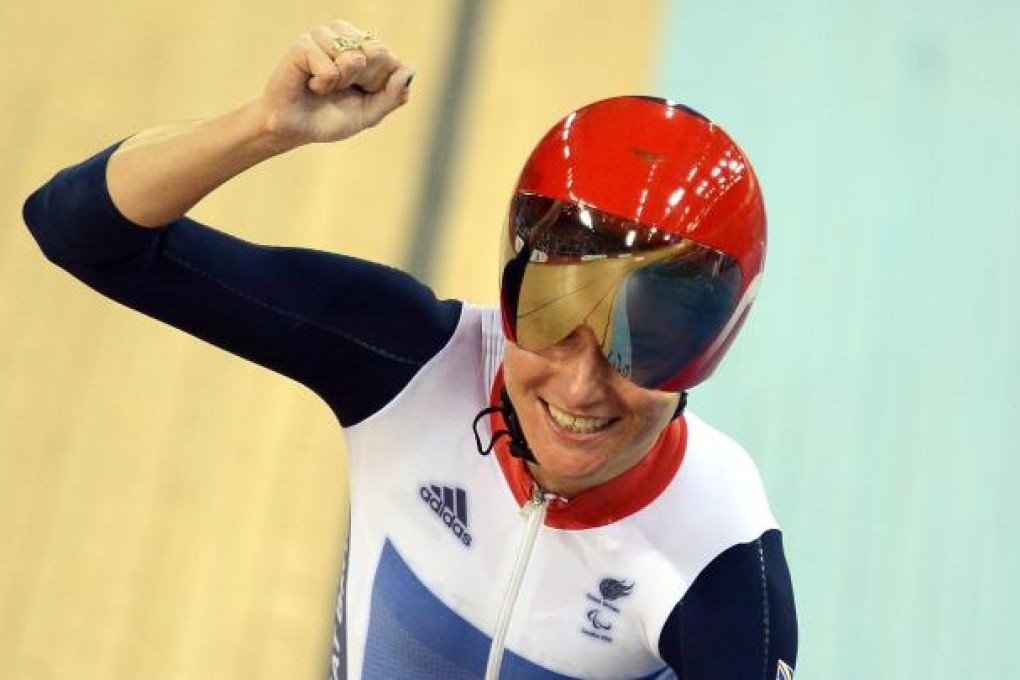 Britain's Sarah Storey celebrates winning gold in the Women's Individual C5 Pursuit Cycling. Photo: EPA