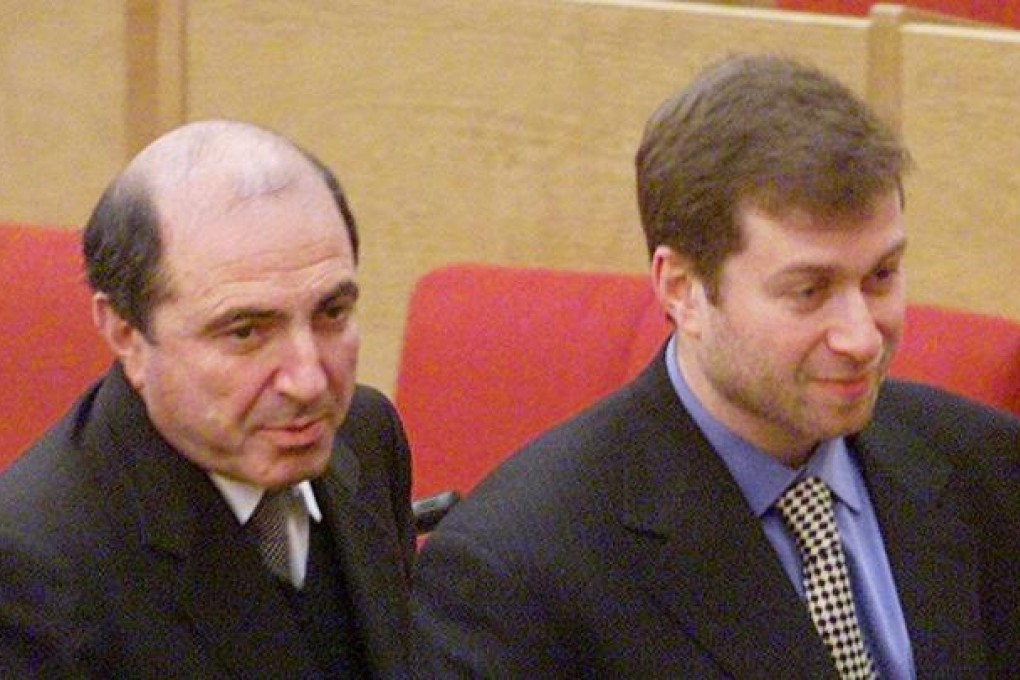 Russian tycoons Boris Berezovsky, left, and Roman Abramovich, then both lawmakers, walk after the session of the State Duma, parliament's lower house, in Moscow. Photo: AP