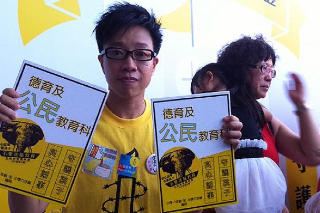 Amnesty International member Connie Chan Man-wai poses at the anti-national education protest in Tamar Park on Saturday. Photo: Jennifer Cheng