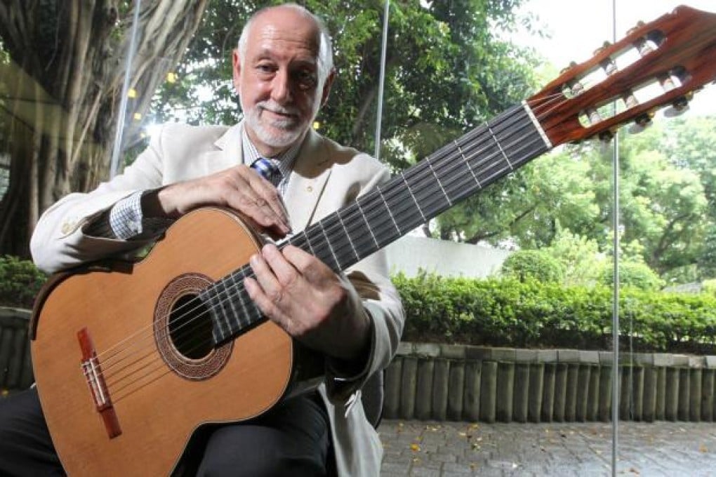 Adrian Walter, the new director of The Hong Kong Academy for Performing Arts, delivered an eloquent classical guitar performance at his public debut yesterday. Photo: May Tse