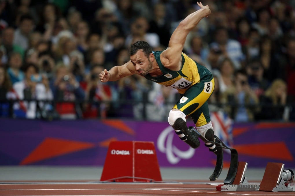 South Africa's Oscar Pistorius comes out the blocks in a Round 1 race of the men's 200m T44 at the London Paralympics. Photo: AP