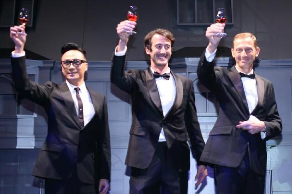 Francis Ng Chun-yu, Damien Batteux and Xavier Beysecker toast Martell's new premium-grade cognac Chanteloup Perspective