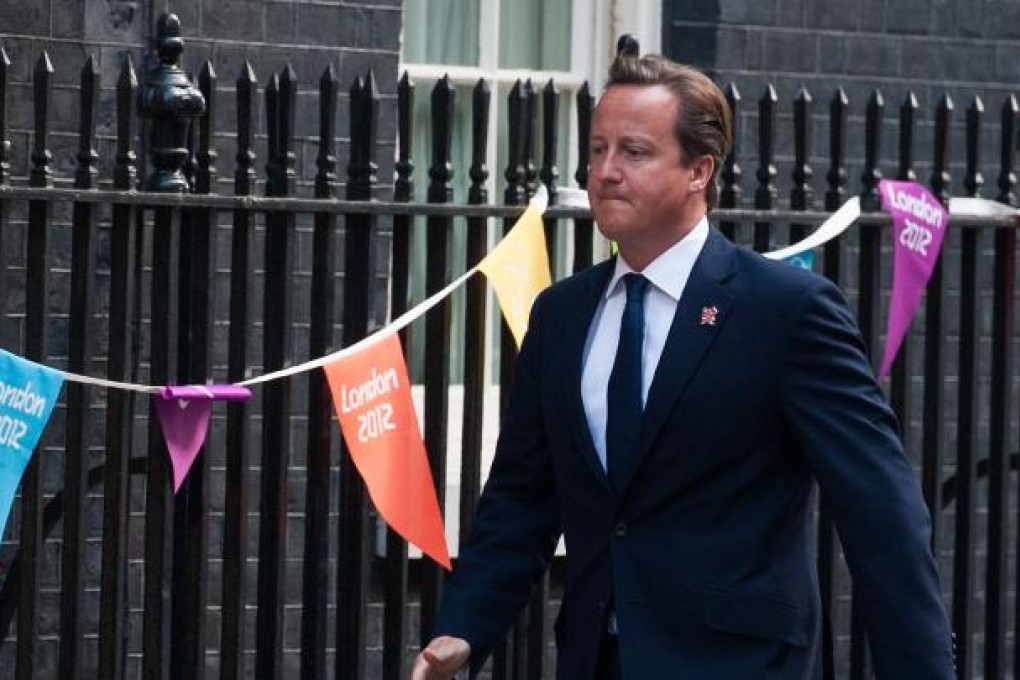 Britain's Prime Minister David Cameron arrives at 10 Downing Street in central London before announcing his first cabinet reshuffle. Photo: AFP