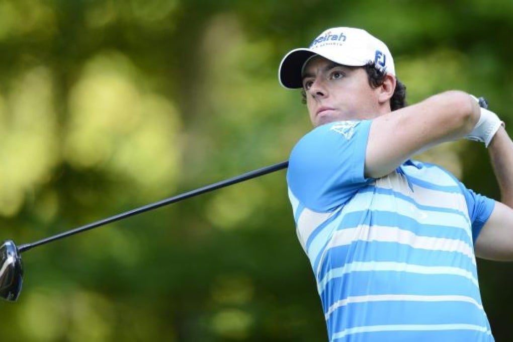 Rory McIlroy hits his tee shot on the ninth hole. He won the PGA Tour’s Deutsche Bank Championship by one shot over Louis Oosthuizen. Photo: EPA