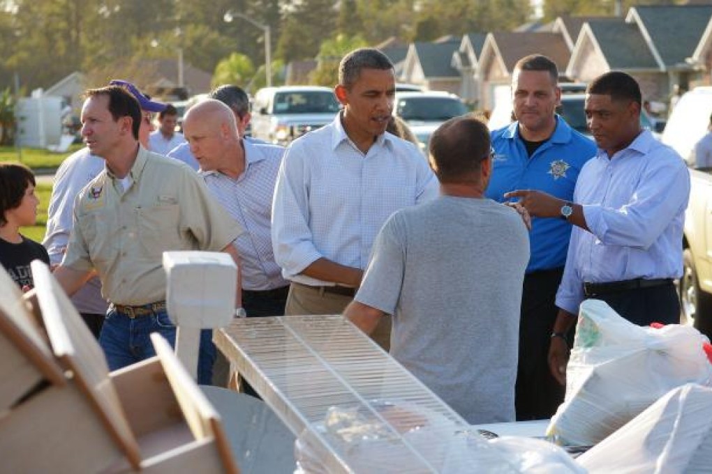 US President Barack Obama tours a neighbourhood in St John the Baptist parish in Louisiana on Monday. Photo: AFP