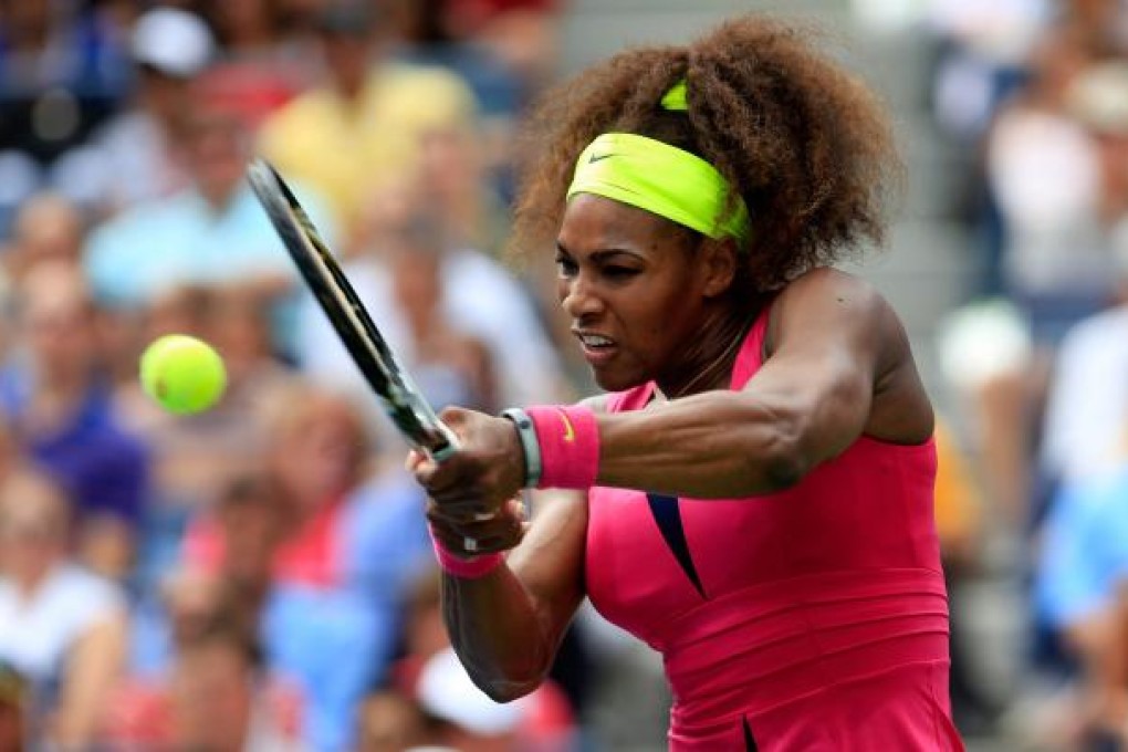 Serena Williams returns a shot against Andrea Hlavackova in New York on Monday. Photo: AFP