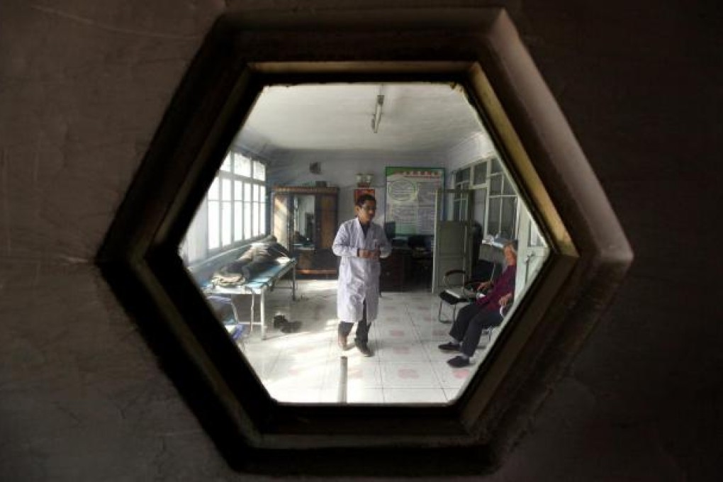 A typical scene in a rural mainland hospital. Beijing plans more hospitals as part of a US$125 billion three-year effort.Photo: Reuters