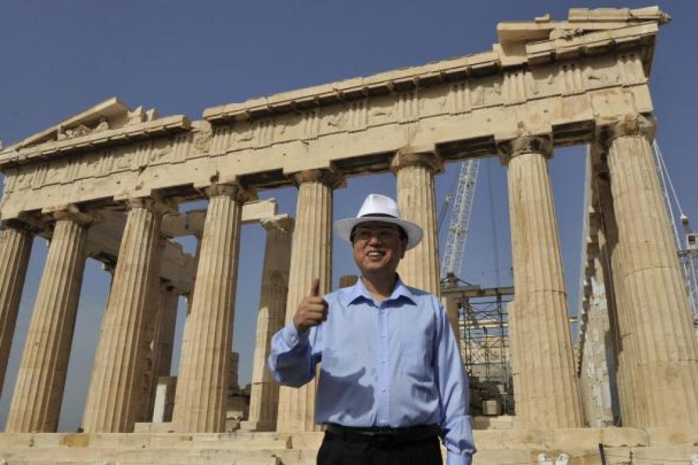 Zhang Dejiang at the Parthenon during a trip to Athens. He earlier impressed Jiang Zemin during a trip to North Korea. Photo: AFP