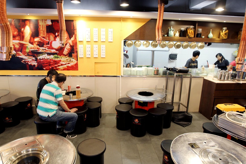 The eatery serves noodles with young radish kimchi (top right) and pork spare ribs.Photos: Dickson Lee