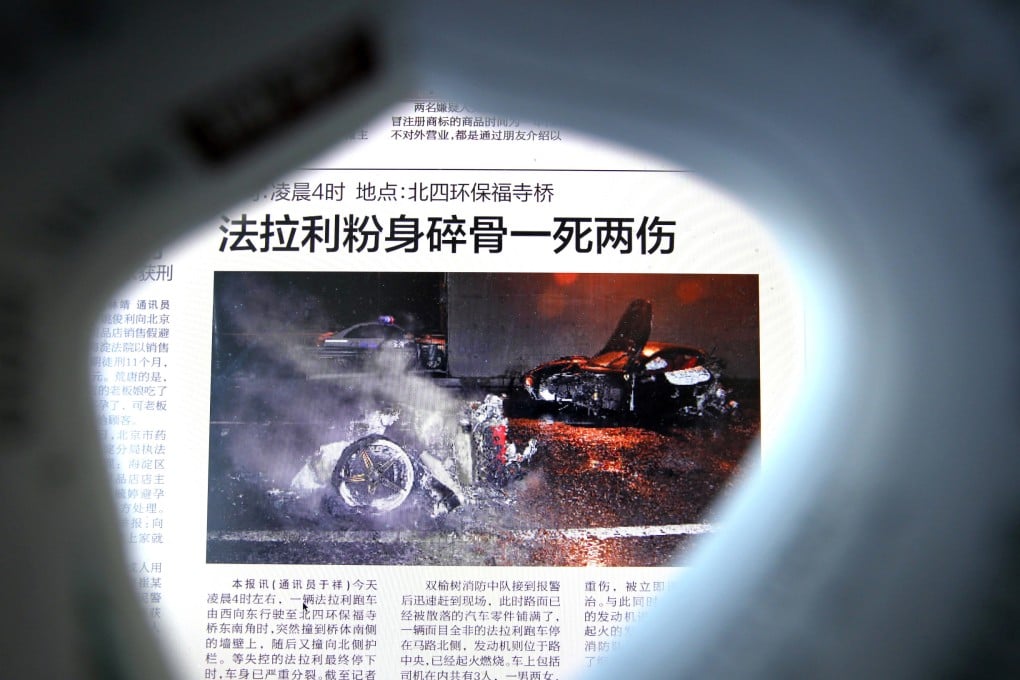 The Beijing Evening News's story, published on March 18, about a speeding  black Ferrari hitting a wall on Beijing's North Fourth Ring Road in the early hours of that day.   Photo by Simon Song