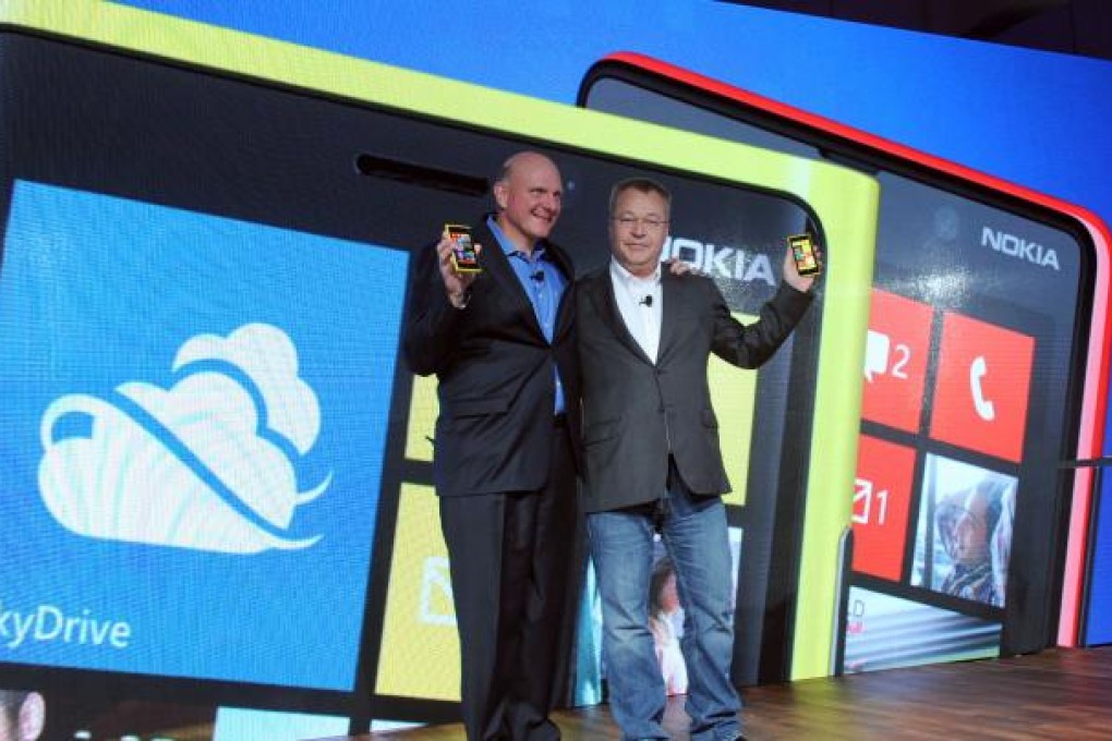 Microsoft chief executive Steve Ballmer, left, and Nokia President and CEO Stephen Elop unveil the Nokia Lumia 920. Photo: AP