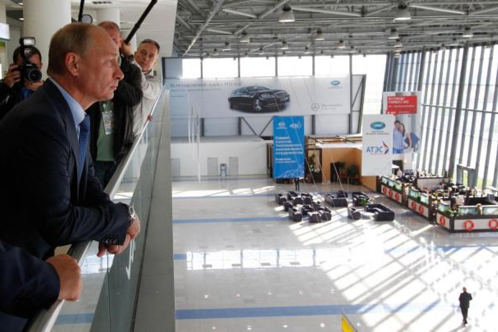 Russian President Vladimir Putin inspects Vladivostok airport ahead of the Apec summit this week. Photo: AFP