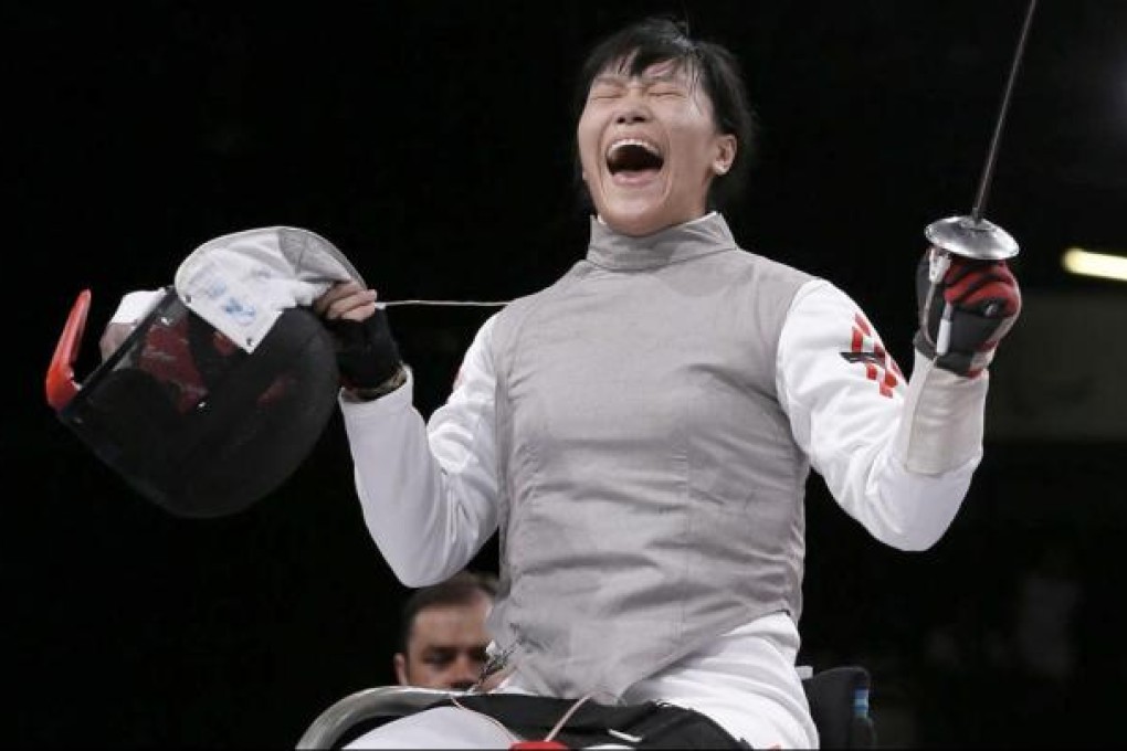 Yu Chui-yee celebrates another fencing gold. Photo: AP