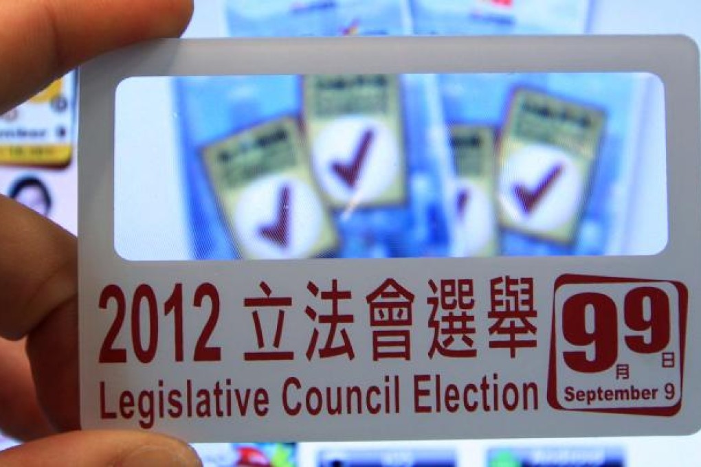 The 2012 Legislative Council Election card, with an embedded magnifying glass for visually impaired voters. SCMP