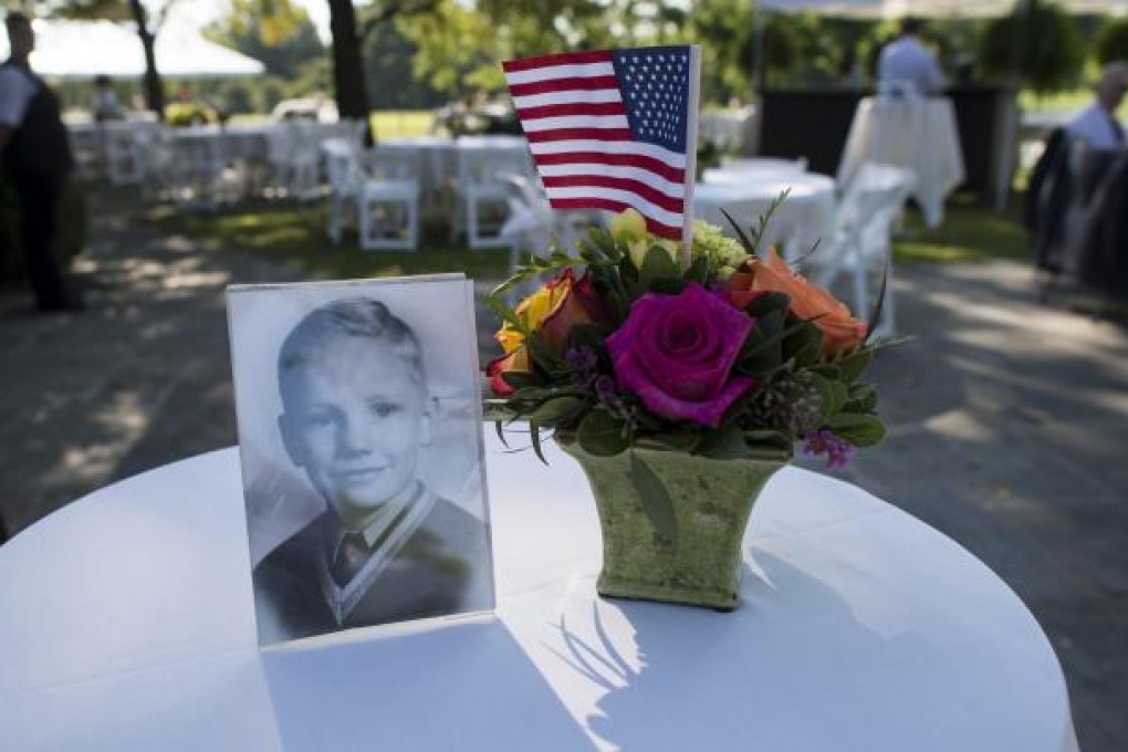 A photo of Neil Armstrong as a boy at a memorial. Photo: EPA
