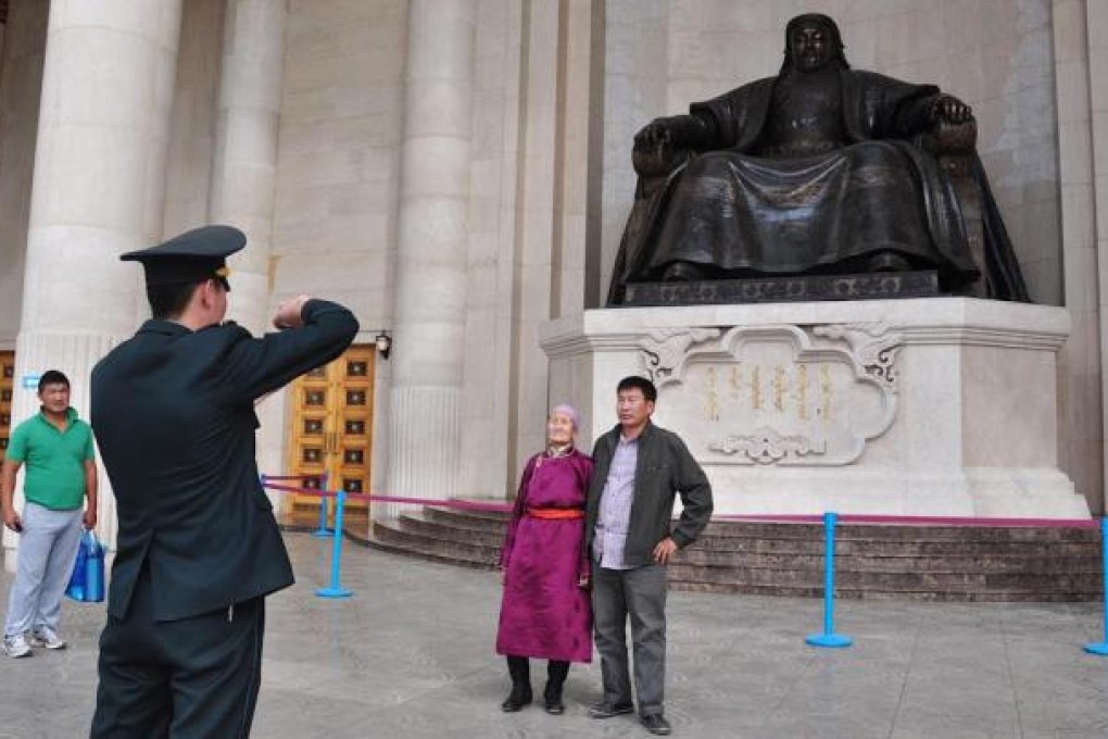 It's a picture of change as Mongolians flock to the Genghis Khan statue which until recently was off-limits to the public. Photo: Michael Kohn