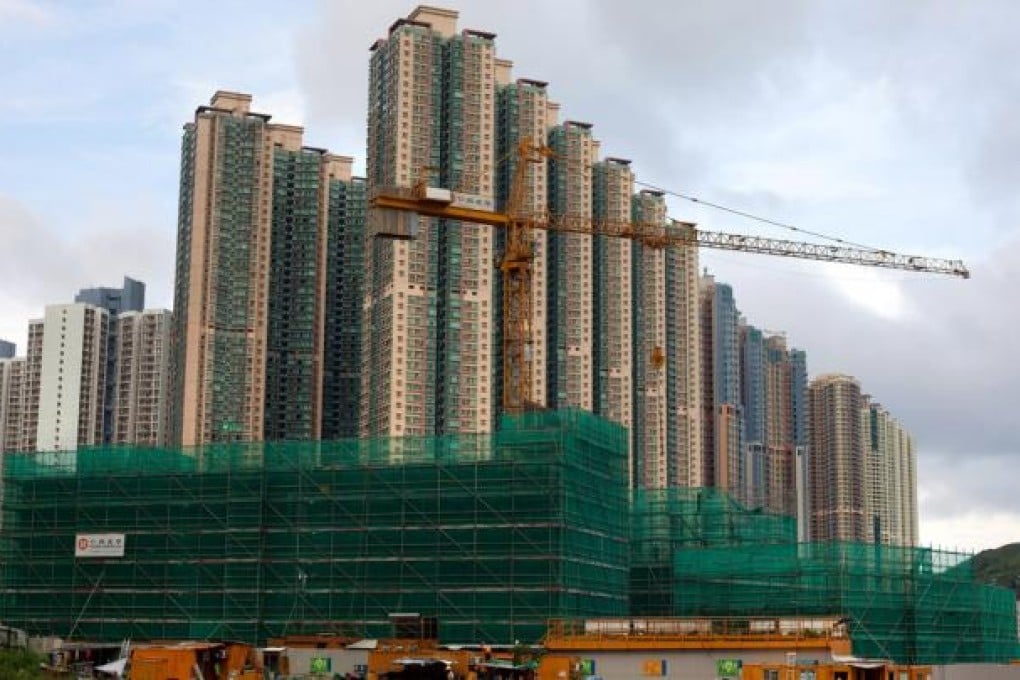 Leung Chun-ying's weak housing policies are not likely to bring down property prices. Photo: Bloomberg