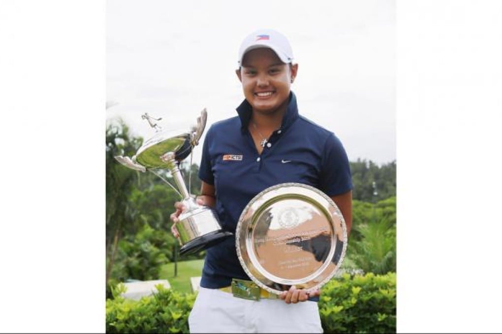 Cyna Marie Rodriguez shows off her trophies. Photo: Daniel Wong
