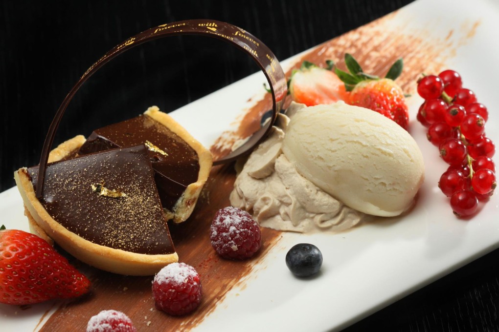 BELGIAN CHOCOLATE TARTLET WITH TOASTED ALMONDS AND CINNAMON GELATO AT FORTE IN L'HOTEL ELAN.