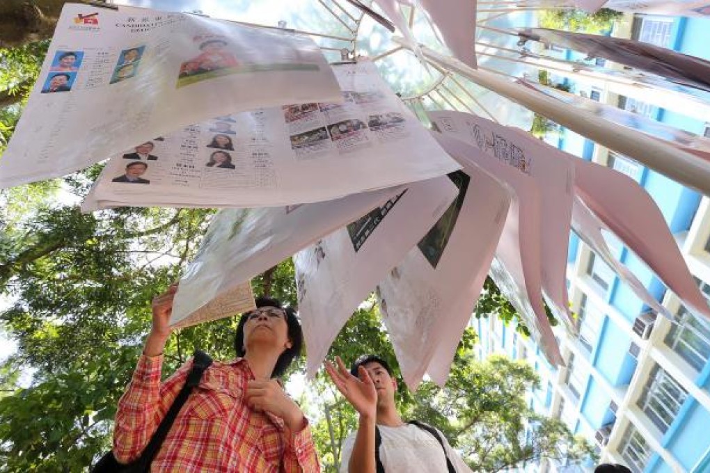 The new electoral system has left voters confused, with some mistakenly given three ballots, while others expressed disappointment at being denied the chance to vote in the super seats. Photo: David Wong