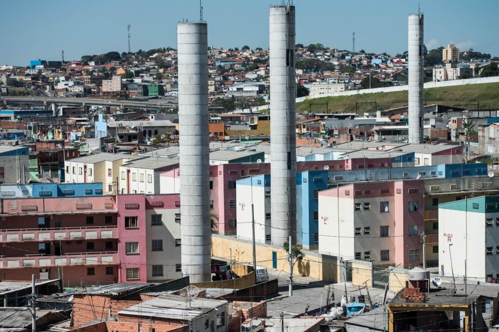 The former shanty town of Uniao de Vila Nova in Sao Paulo has been transformed with upgraded flats and water towers.Photo: AFP