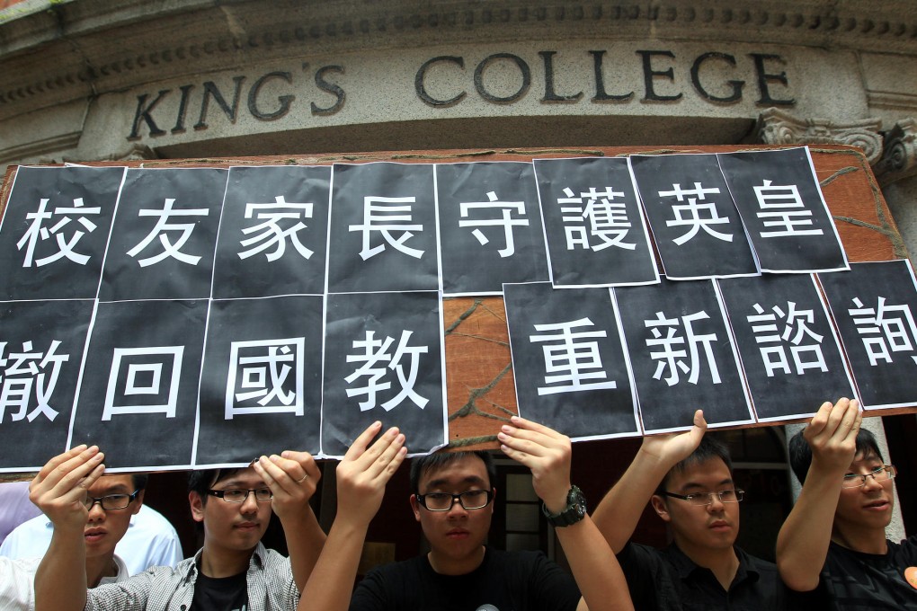 Alumni protesting outside King's College. Photo: Jonathan Wong