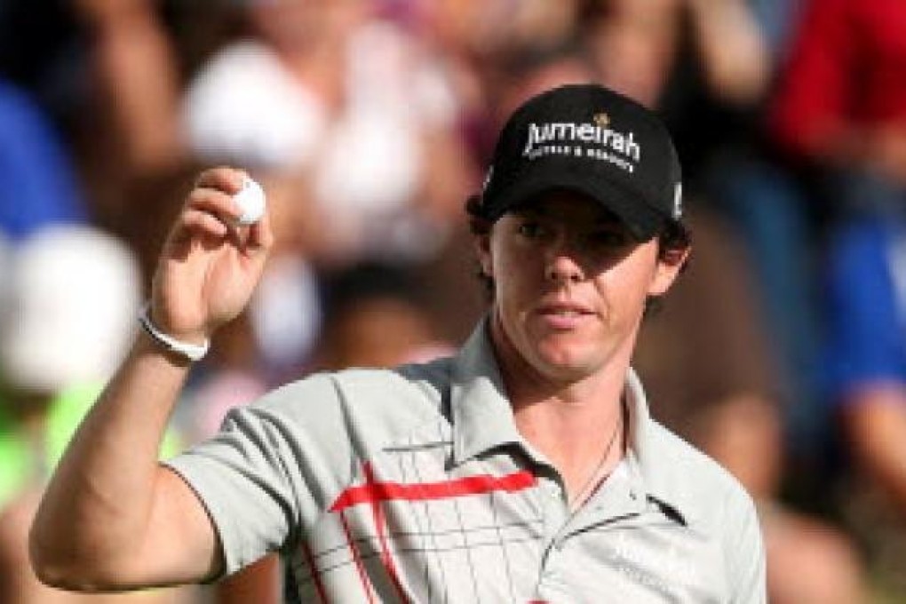 Rory McIlroy of Northern Ireland reacts after he made his final putt on the 18th green to finish -20 and win the tournament during the final round of the BMW Championship at Crooked Stick Golf Club on Sunday. Photo: AFP
