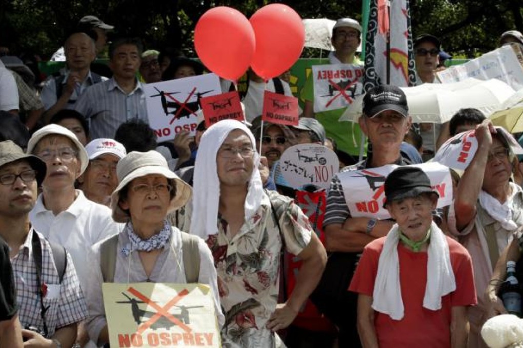 Protesters descended on the parliament building in Tokyo. Photo: AP