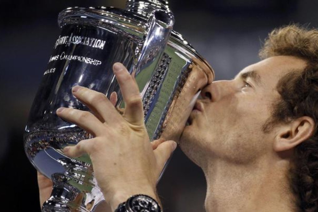 Britain's Andy Murray kisses the US Open trophy after defeating Novak Djokovic in an epic five-set final in New York. Photo: Reuters