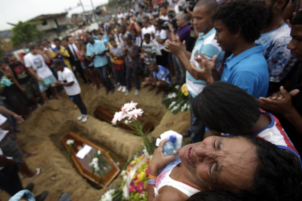 Funeral held for slain Brazilian teens