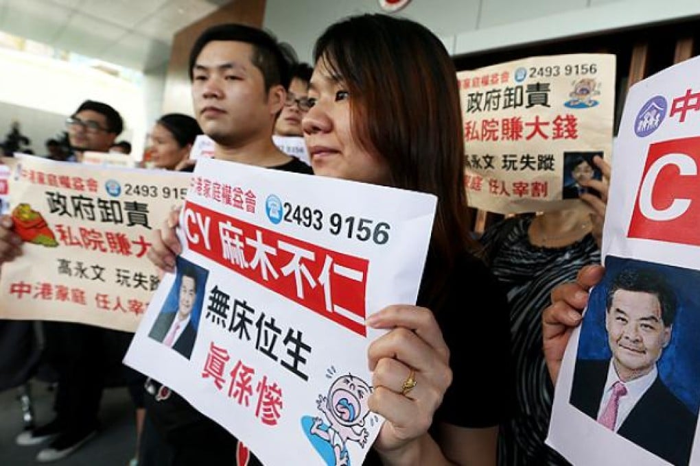 The Mainland-Hong Kong Families Rights Association protest outside Central Government Offices in Tamar. Photo: Sam Tsang
