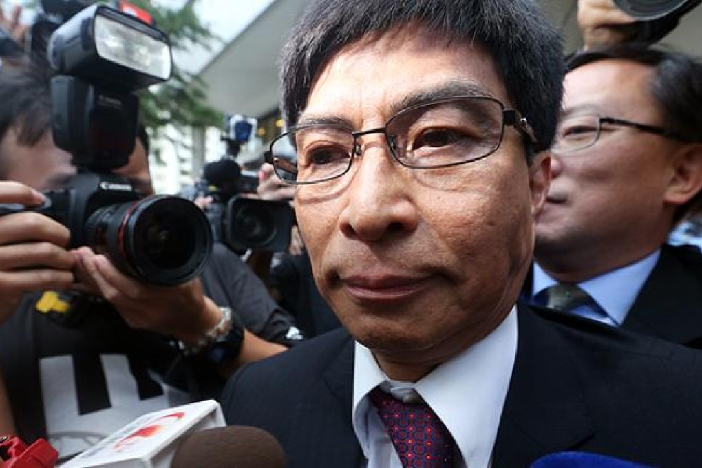 Sun Hung Kai Properties Executive Director Thomas Chan Kui-yuen leaves  Eastern Court in Sai Wan Ho. Photo: Sam Tsang