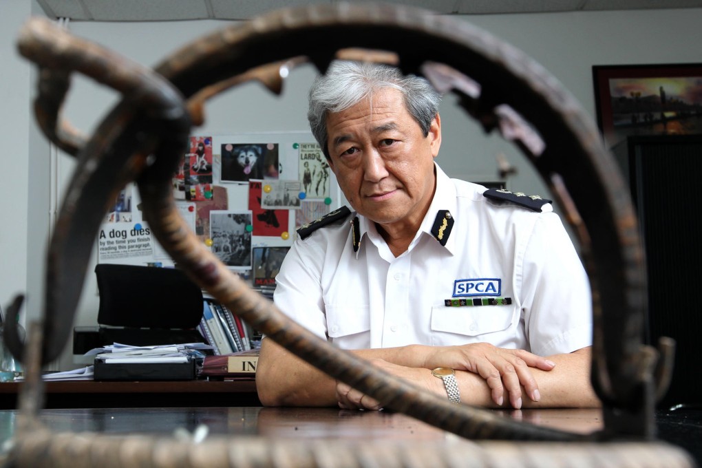 SPCA's Tony Ho Tse-tong with an animal trap. Photo: May Tse