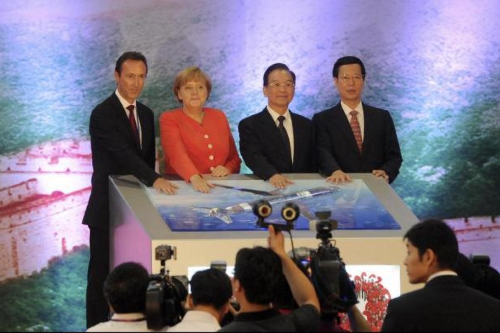 Zhang Gaoli (right) with Premier Wen Jiabao, Airbus chief Fabrice Bregier (left) and German leader Dr Angela Merkel. Photo: Reuters