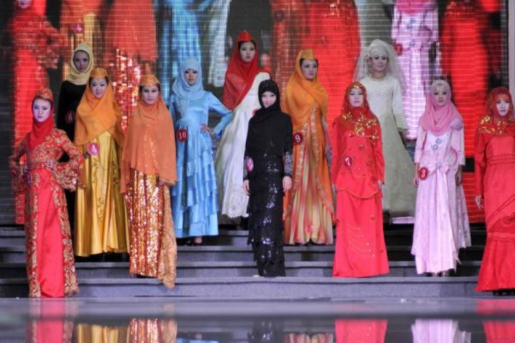 Contestants in traditional Hui costumes pose during the 3rd China-Arab States Economic and Trade Forum in Yinchuan. Photo: Xinhua