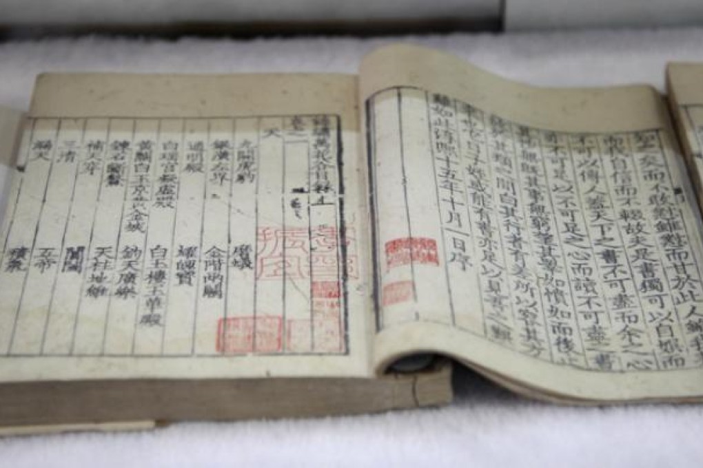 The 800-year-old, 40-volume, 2000-page Chinese encyclopaedia is on display at the international book fair on Friday in Taipei. Photo: AP