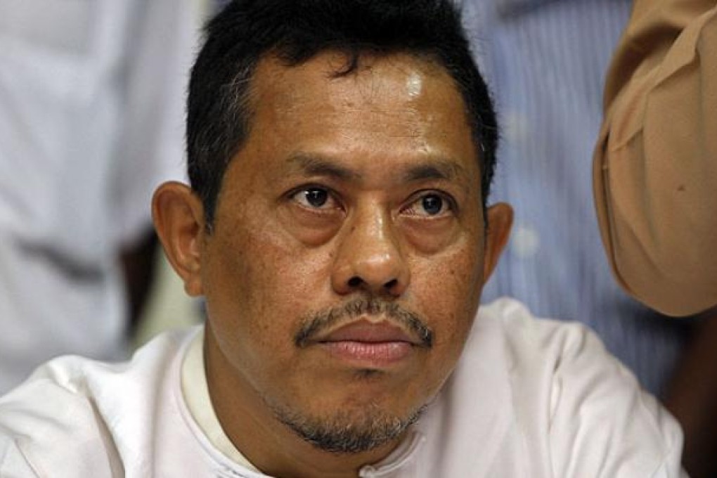 Former exiled Myanmar student leader Moe Thee Zun talks to media at a hotel in Yangon after being removed from a government blacklist. Photo: AFP